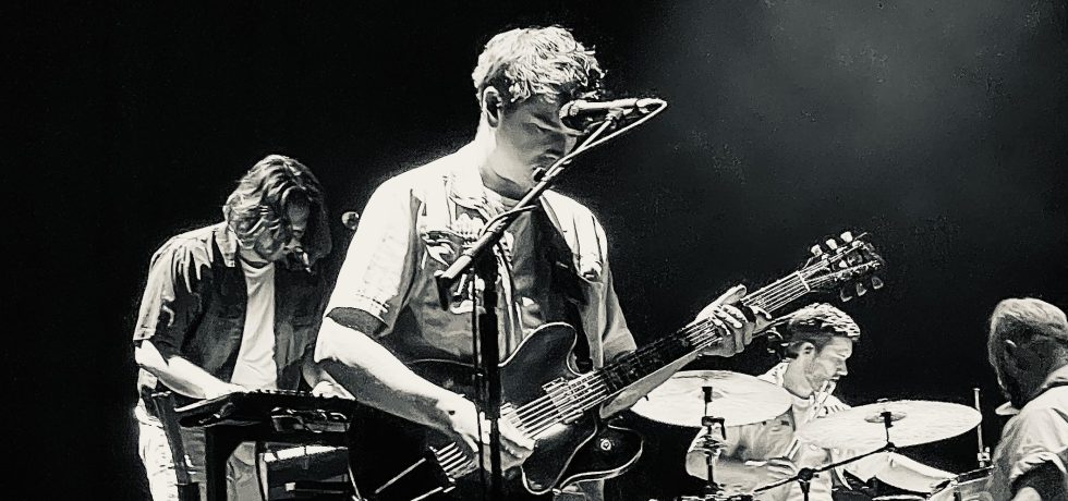 Black and White image of Everything Everything on stage at Forum Melbourne