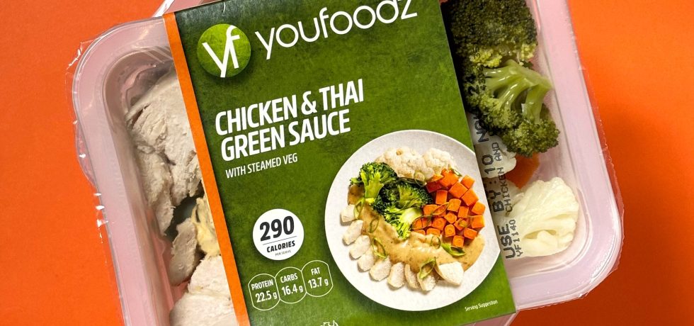 Youfoodz chicken thai green sauce in packaging on orange background