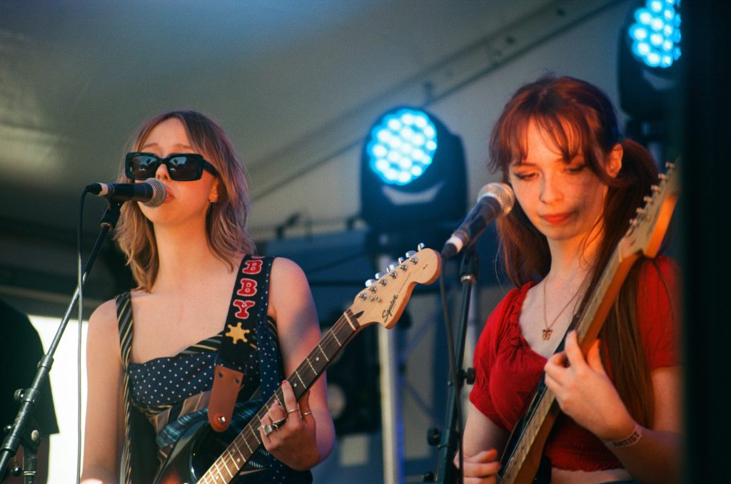 Guitarist and singer from Mansplainers at St Kilda Festival
