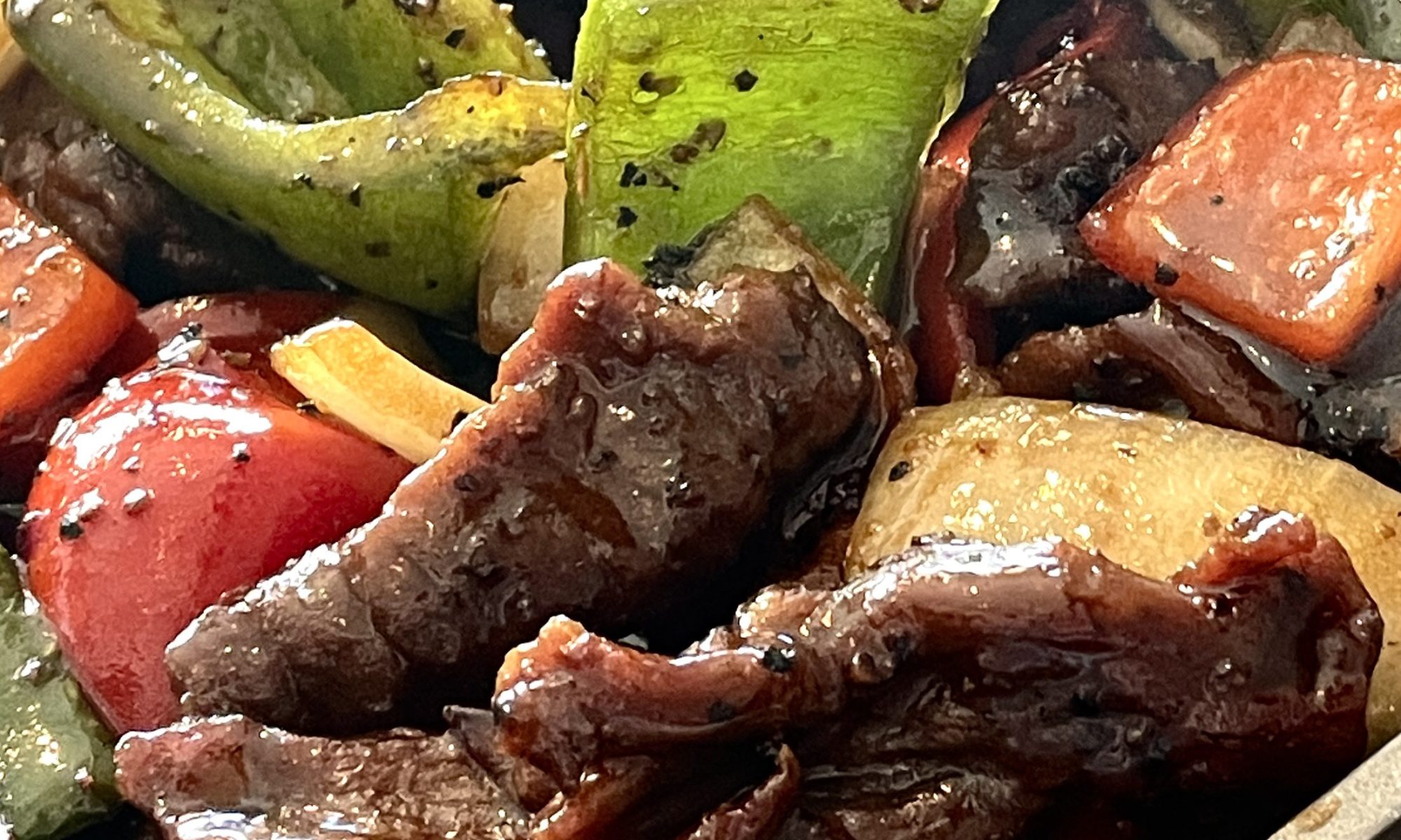 Close up of beef in black pepper sauce from Jymmanuel Eatery in Ripponlea