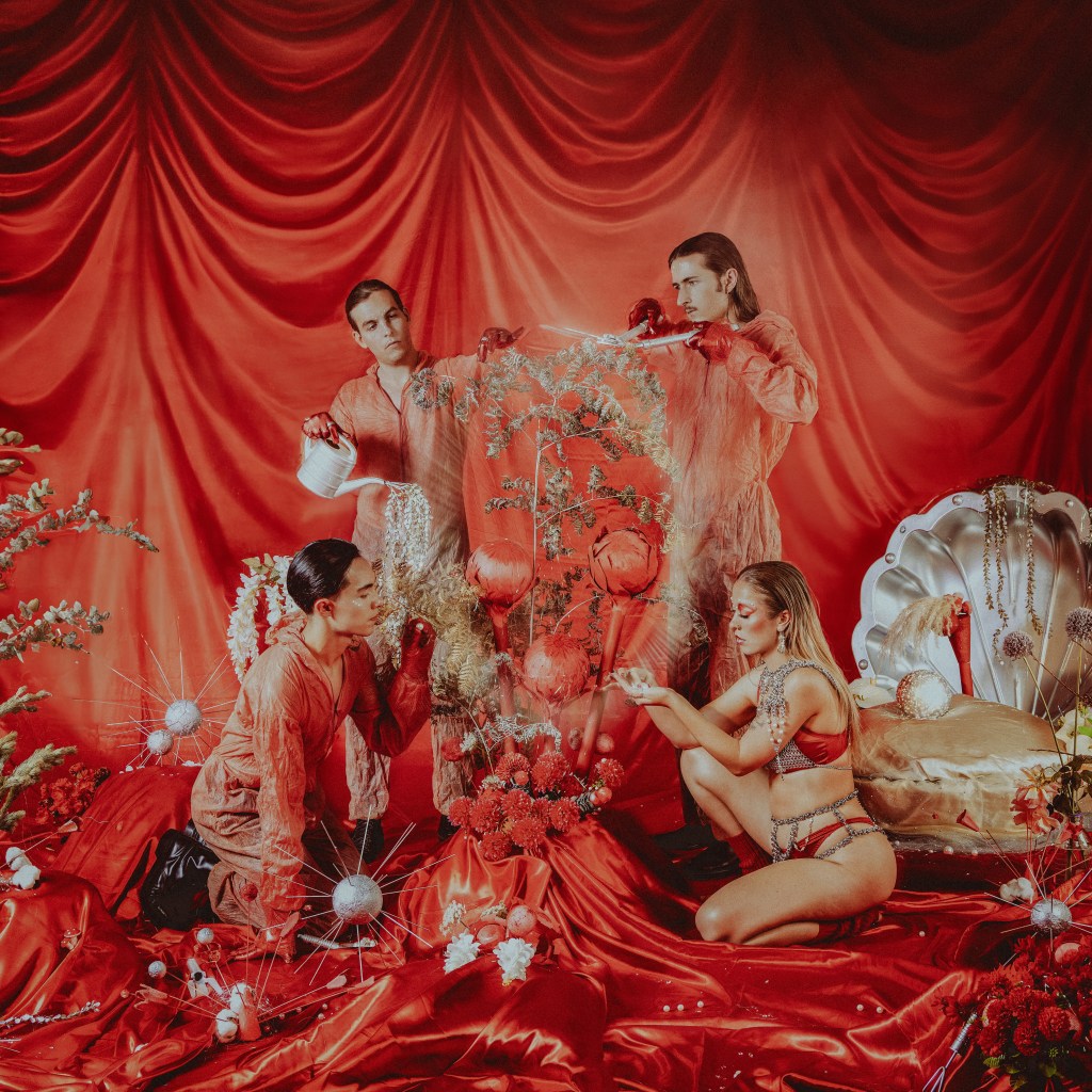 Velvet Bloom band against a red backdrop