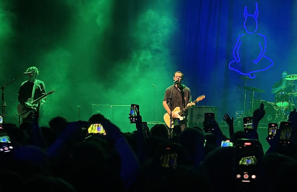 Wunderhorse perfroming at Melbourne's Forum with blue and grteen stage lights