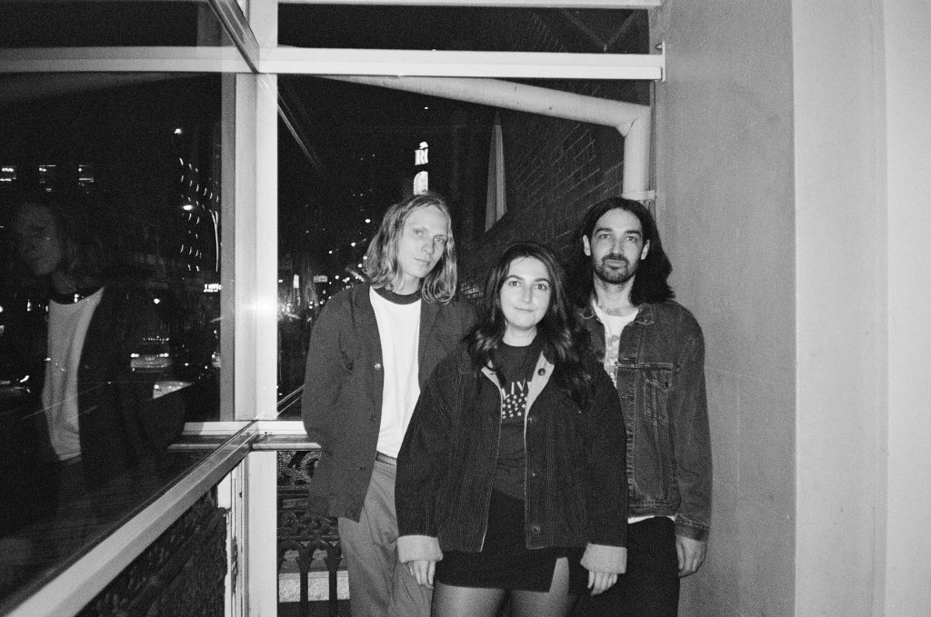 Black and white image of band People Mover for album Cane Trash