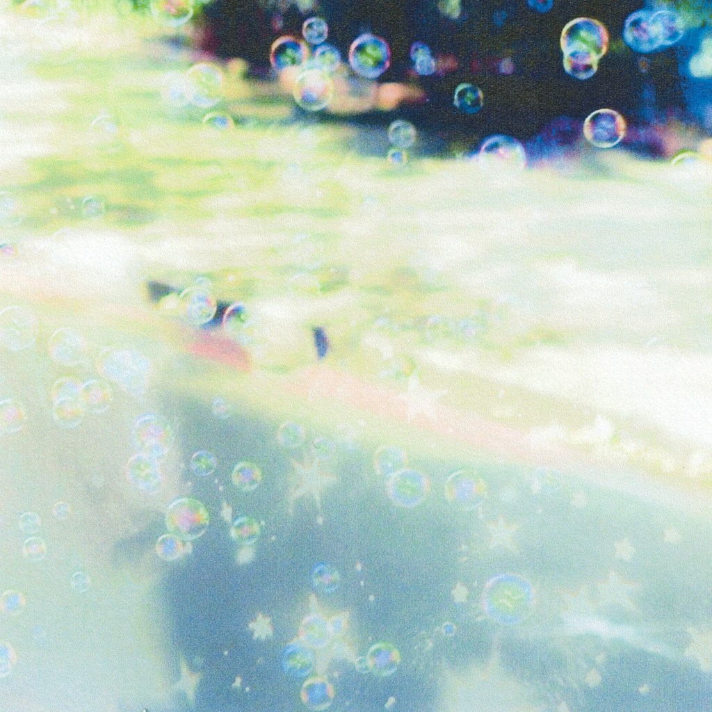 Bubbles against a backdrop of sky reflected in water. EP cover for Paint - Forever and Always