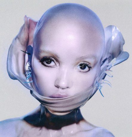 Close up of FKA twigs with a shaved head and fabric covering her mouth. Albun cover from EUSEXUA Afterglow