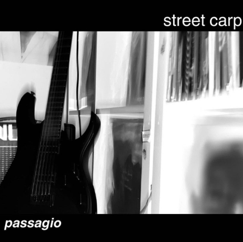 Black and white blurred image of a guitar. Cover of Street Carp Passagio