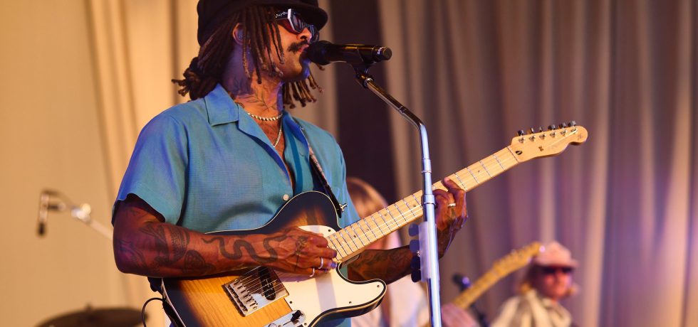 Close up of Ocean Alley's front man performing at Catani Gardens, St Kilda, Melbourne