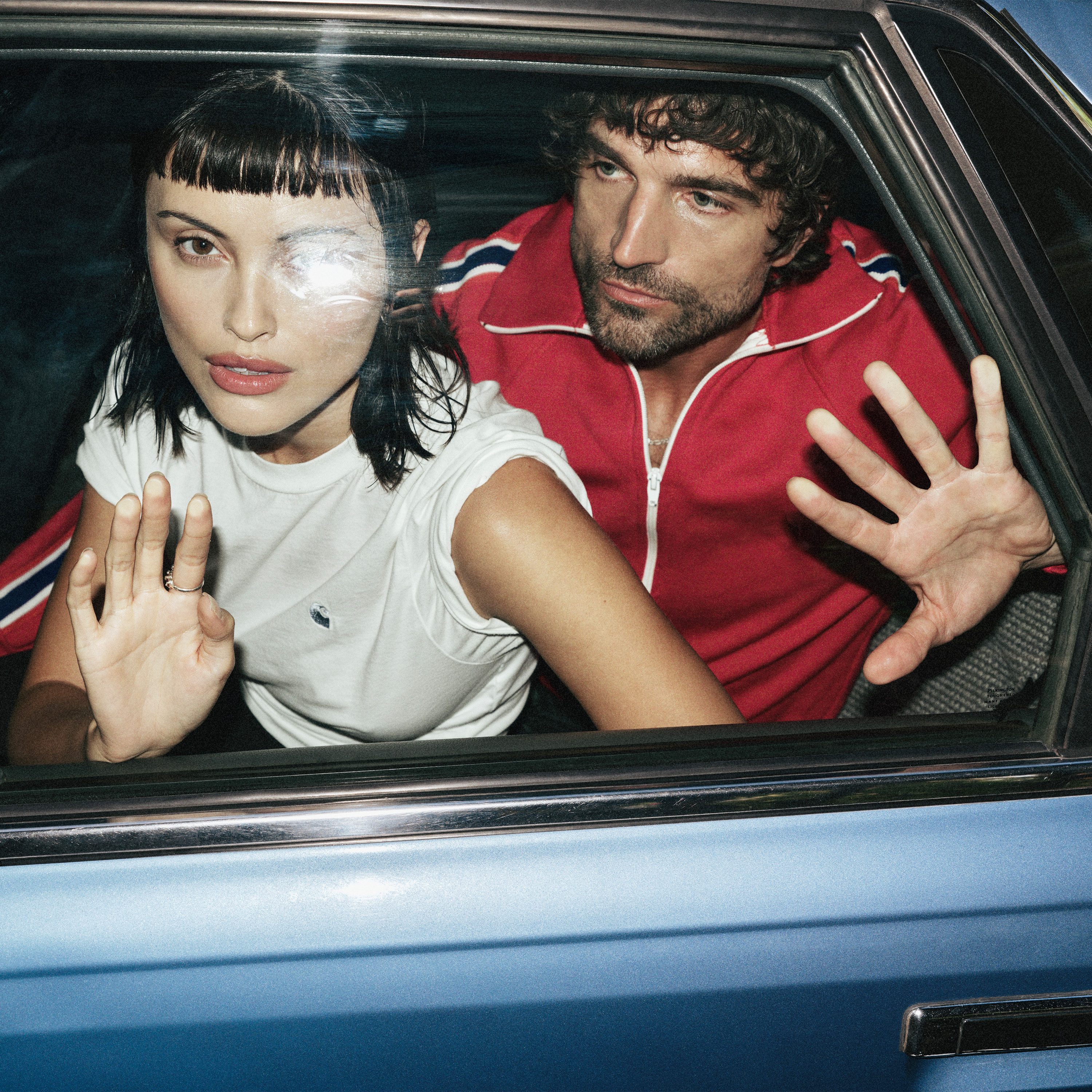 Image of Sydney music duo Pamela seated in the back of a car. Press image for Better Than Before