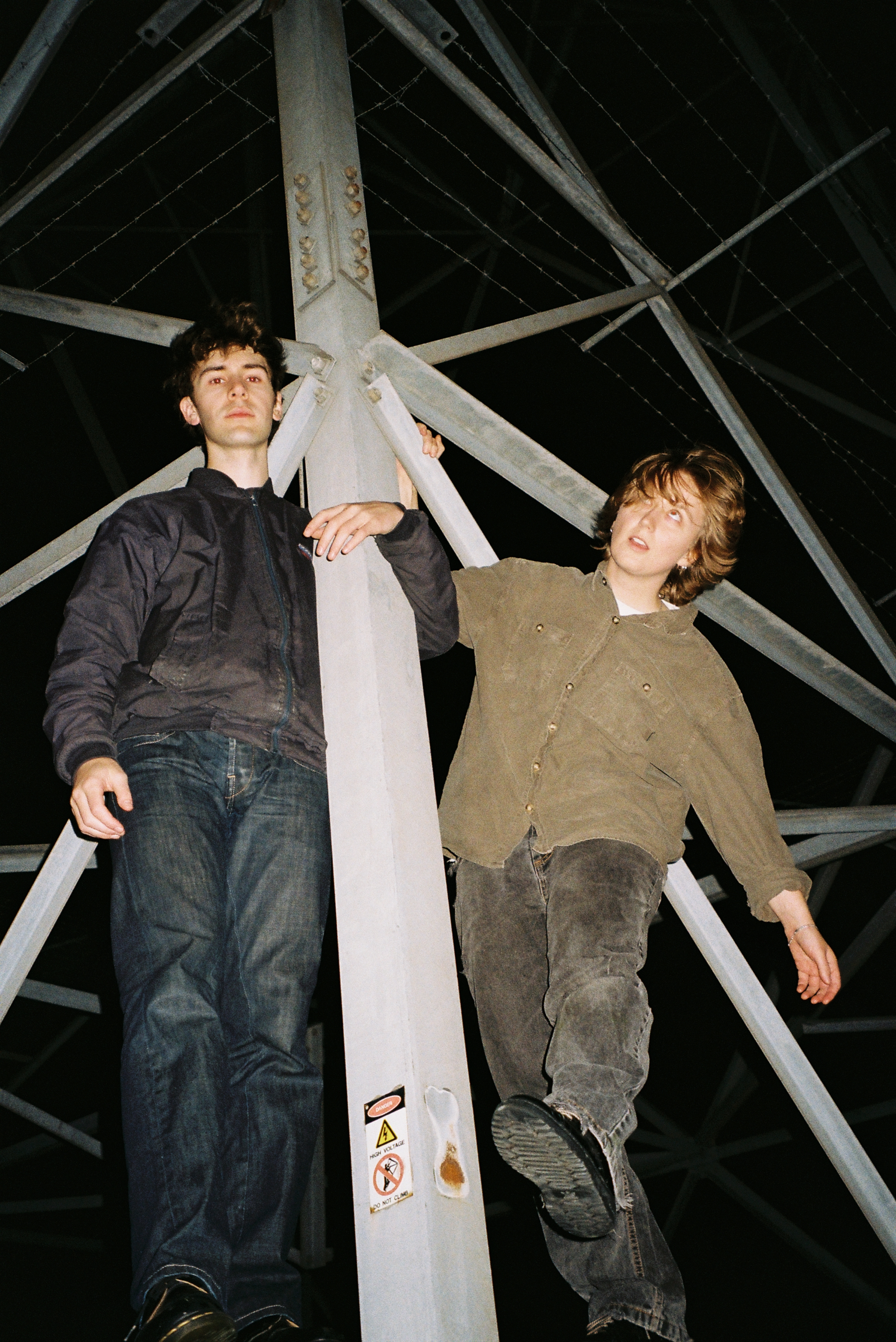 Image of Wishlists. climbing a metal structure. Press image for Ceilings
