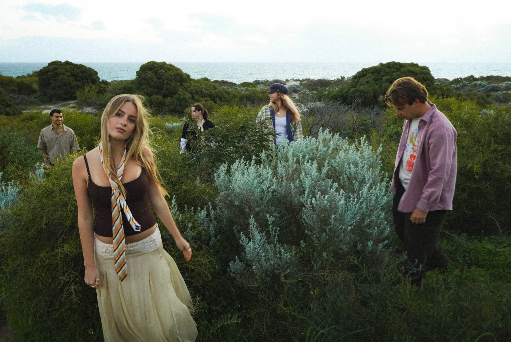 image of band navy june taken in a park or grassland area
