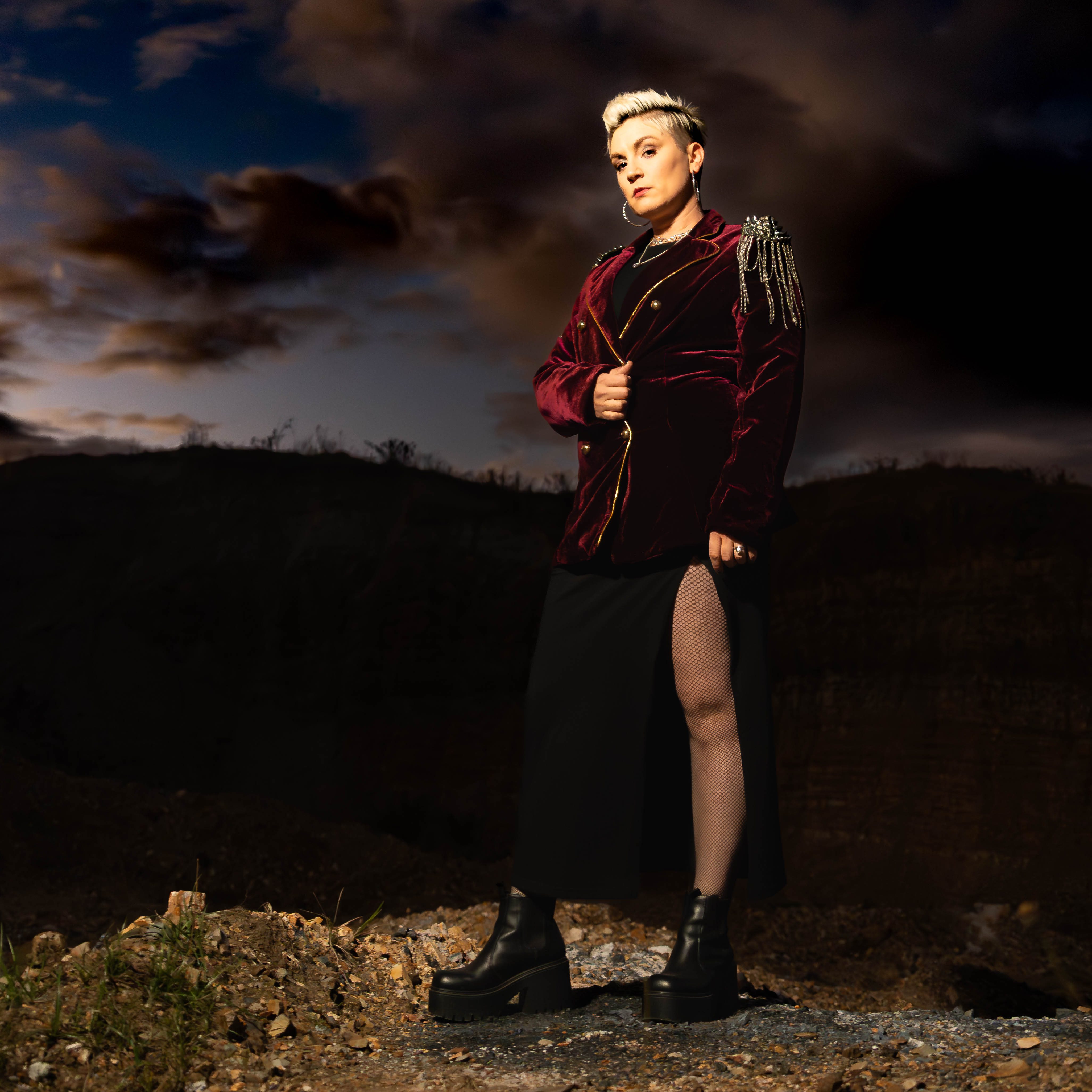 Image of Laura Frank against a dark moody sky