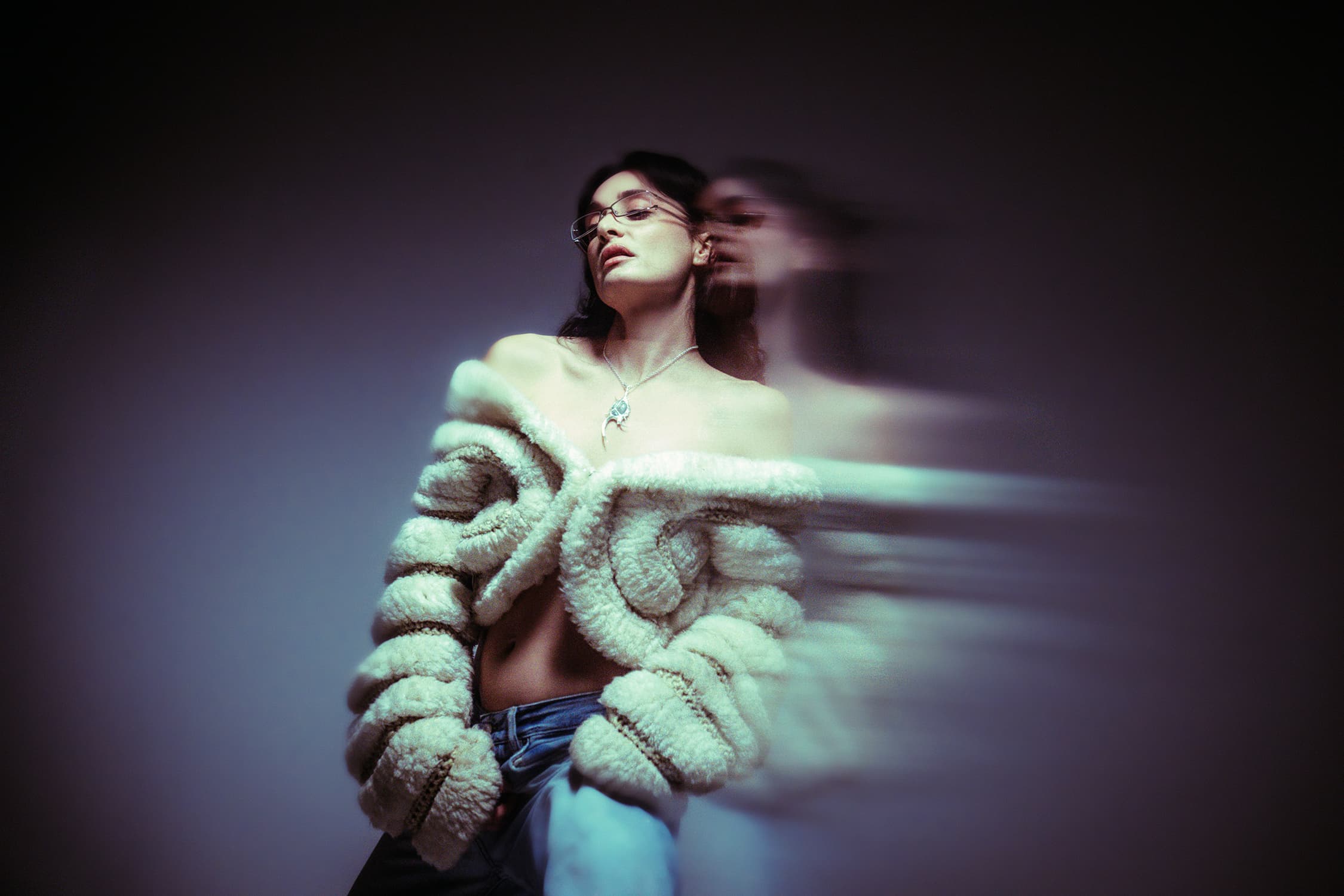 Image of Rayhab against a dark background with motion blur